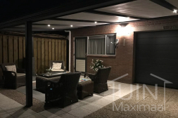 Gumax® ledverlichting met zonwering in een klassieke terrasoverkapping